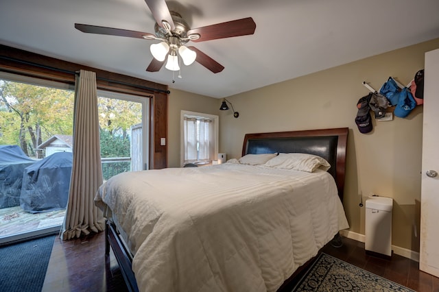 bedroom with access to outside, ceiling fan, and dark hardwood / wood-style floors