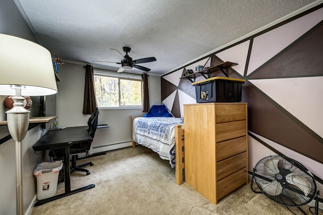 bedroom featuring ceiling fan, carpet floors, a textured ceiling, and ornamental molding