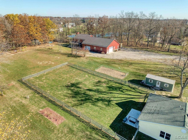 birds eye view of property with a rural view