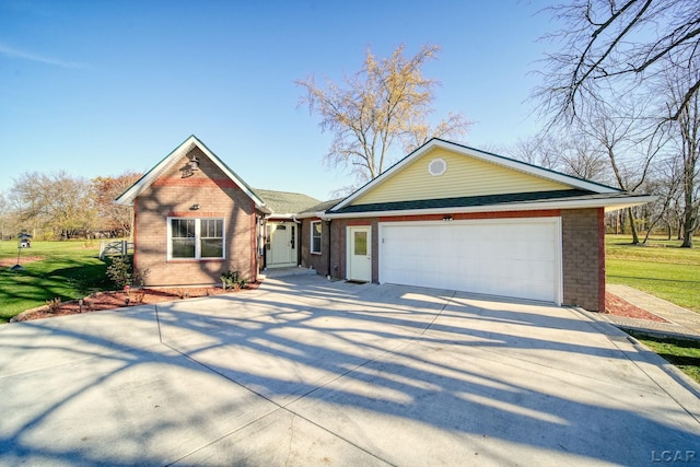 single story home with a front lawn and a garage