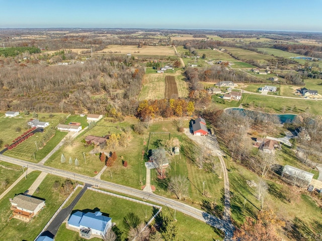 birds eye view of property featuring a rural view