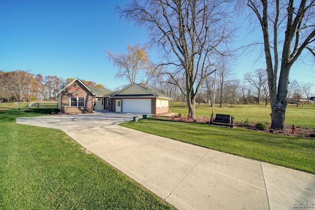 ranch-style home with a garage and a front yard