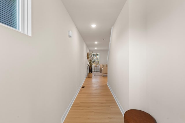 733 Jefferson Ln, Milan, MI 48160 - hallway featuring light wood finished floors, recessed lighting, and baseboards