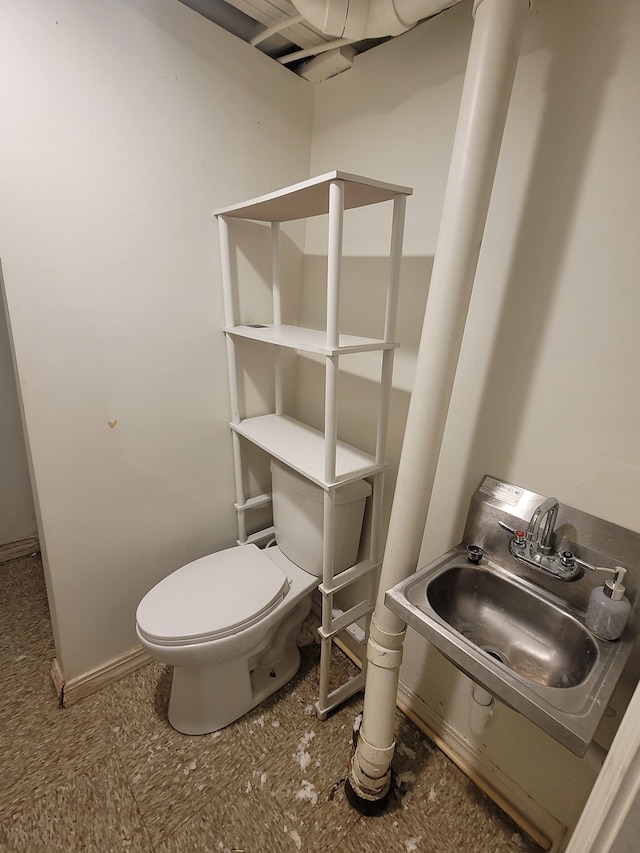 bathroom with sink and toilet