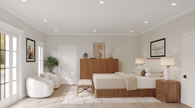 bedroom featuring crown molding and light hardwood / wood-style flooring