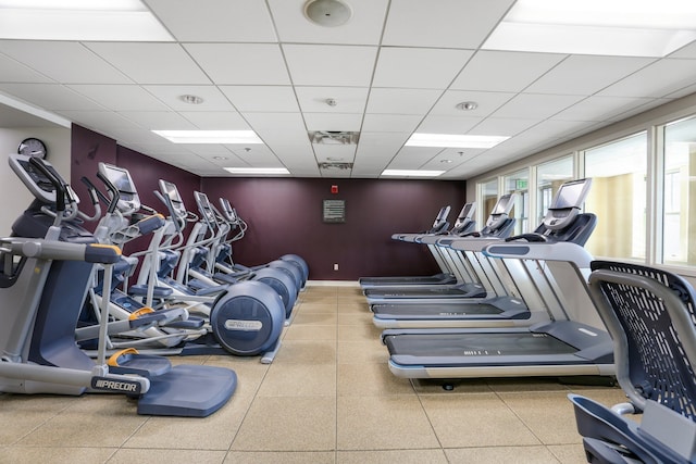 workout area with a drop ceiling