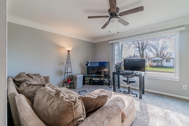 living room with carpet and ceiling fan