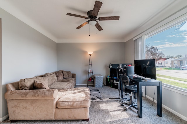 office space with ceiling fan and carpet floors