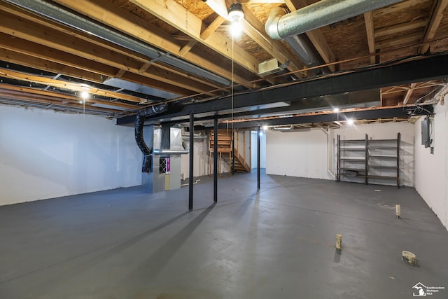 basement featuring heating unit