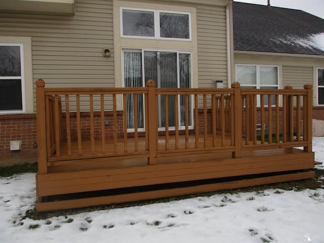 view of snow covered deck