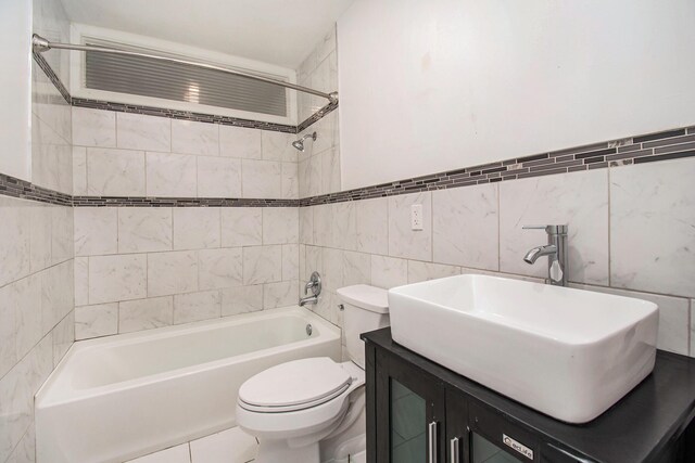 2955 Burlington Dr, Saginaw, MI 48601 - full bath featuring toilet, tub / shower combination, tile walls, and vanity
