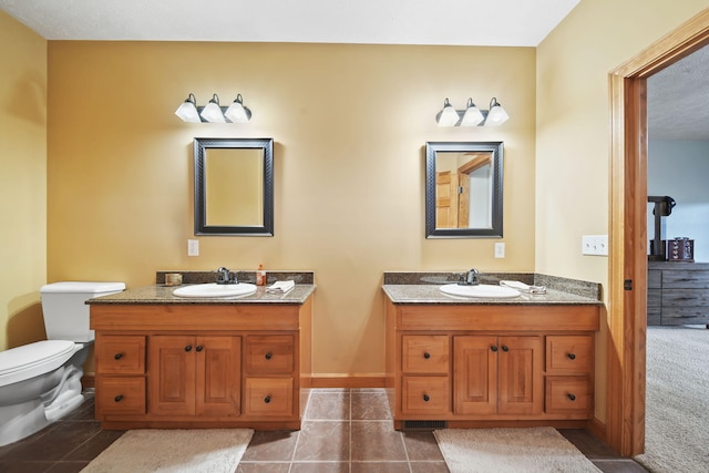 bathroom featuring vanity and tile patterned floors