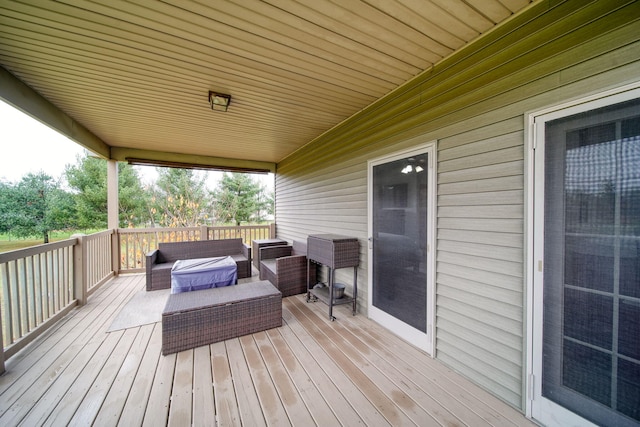 deck featuring an outdoor living space