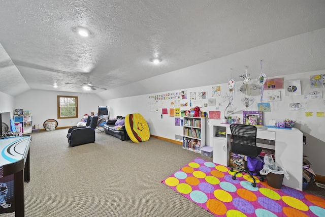 rec room with a textured ceiling, ceiling fan, carpet floors, and lofted ceiling