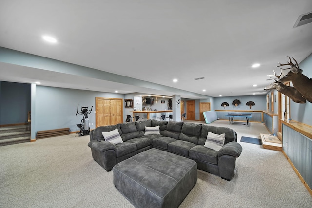 living room with light colored carpet