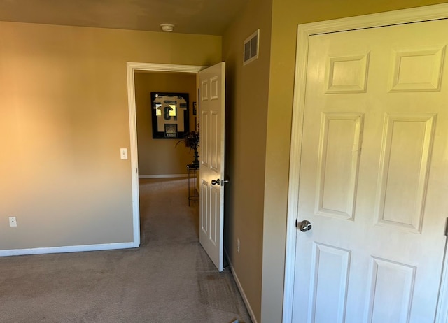 22031 Goldenwillow Dr, Macomb, MI 48044 - corridor featuring visible vents, baseboards, and dark colored carpet