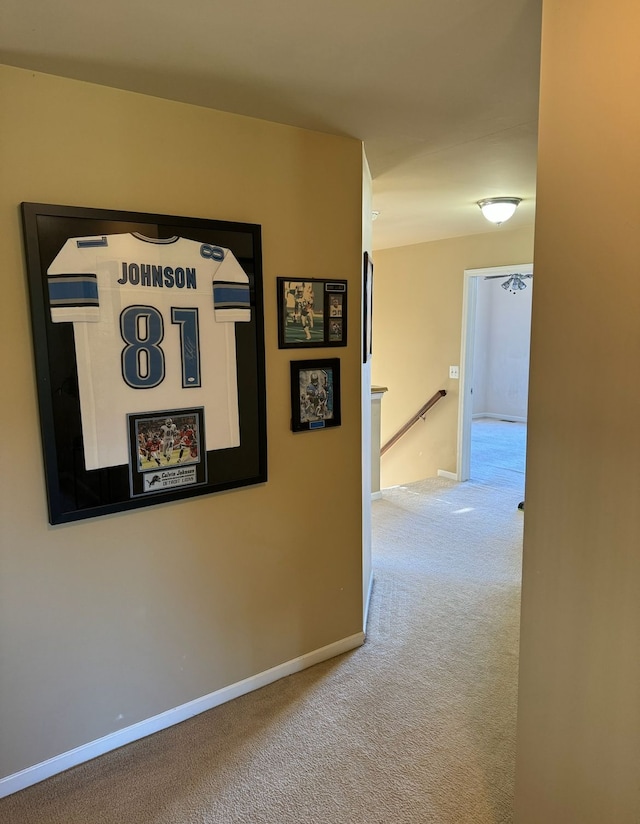 22031 Goldenwillow Dr, Macomb, MI 48044 - corridor featuring baseboards, carpet flooring, and an upstairs landing