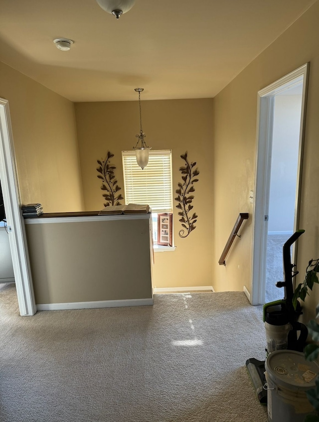 22031 Goldenwillow Dr, Macomb, MI 48044 - interior space with baseboards, carpet flooring, and decorative light fixtures