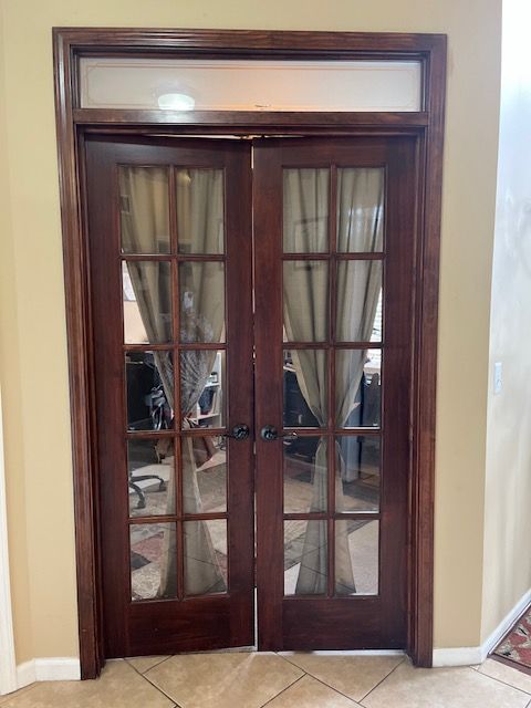 22031 Goldenwillow Dr, Macomb, MI 48044 - doorway with french doors, baseboards, and light tile patterned floors