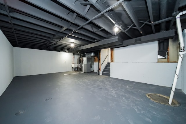 basement featuring heating unit