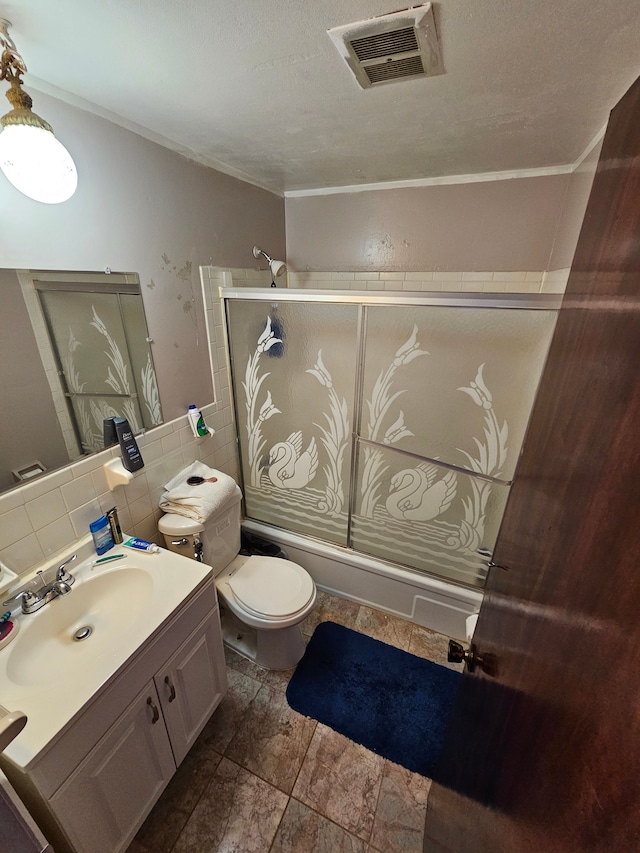 full bathroom with backsplash, tile patterned floors, vanity, and ornamental molding