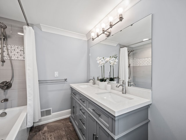 bathroom with vanity and shower / tub combo with curtain