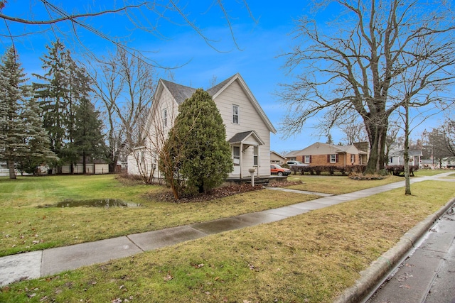 view of front of home featuring a front lawn