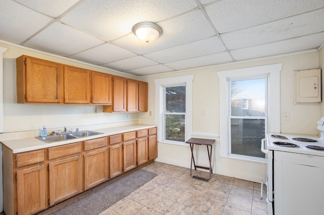 kitchen with sink, light tile patterned floors, a drop ceiling, and white electric stove