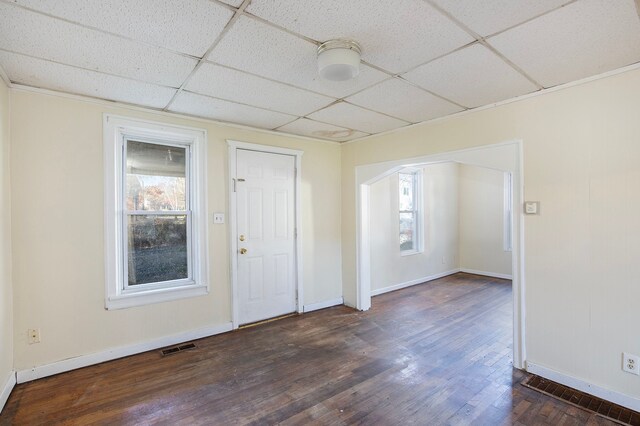 35930 Washington St, Richmond, MI 48062 - entrance foyer with healthy amount of natural light, baseboards, a drop ceiling, dark wood-style flooring, and arched walkways