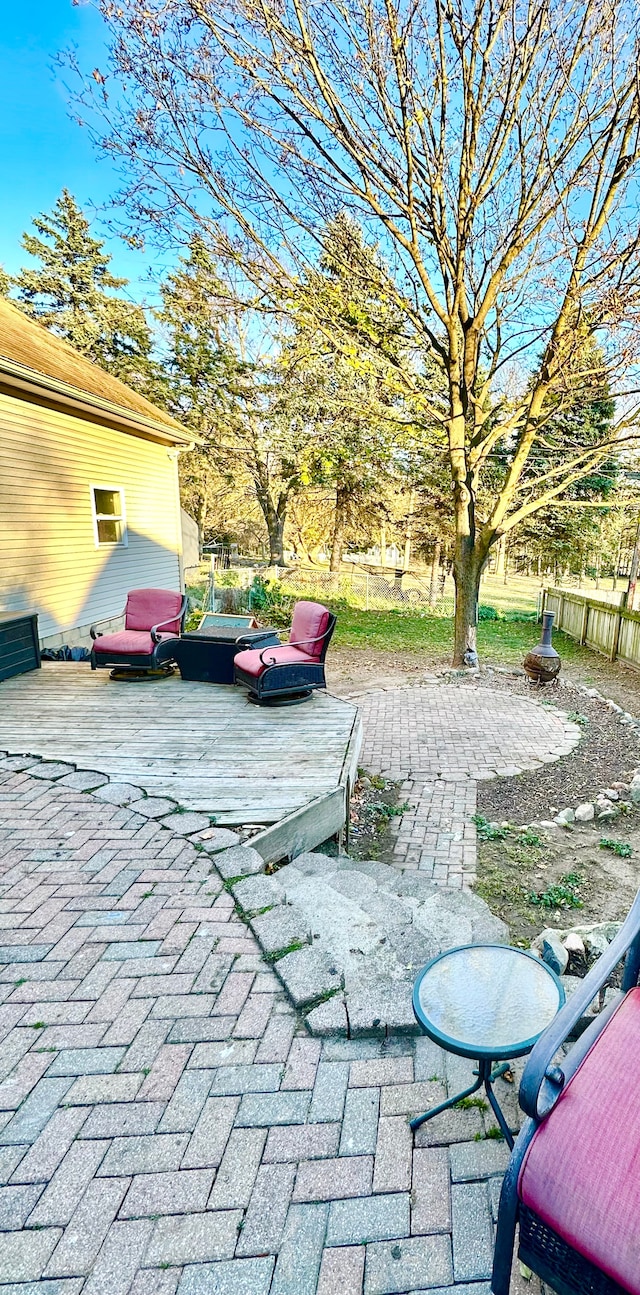 view of patio with a wooden deck