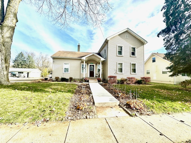 view of front facade featuring a front yard