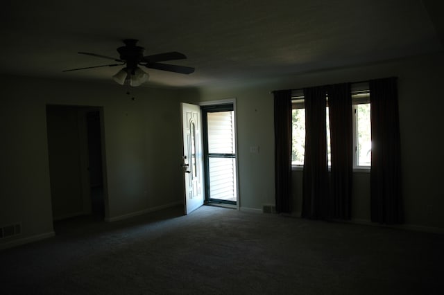 carpeted empty room with ceiling fan