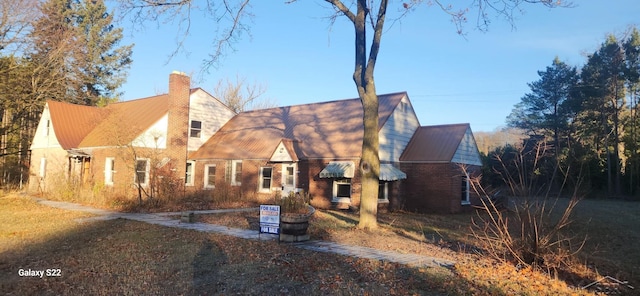 1701 Home Dr, Fairview, MI 48621 - view of rear view of house