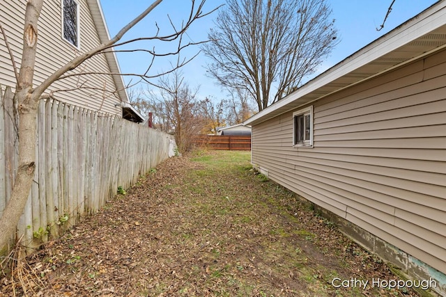 view of yard featuring fence