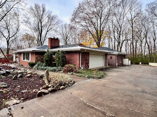 view of property exterior with a garage