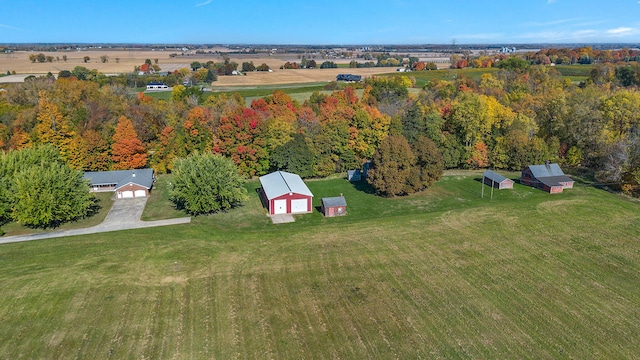 birds eye view of property featuring a rural view