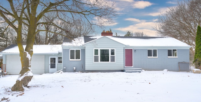 view of front of home with a garage