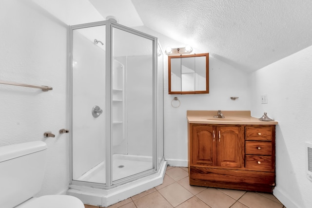 bathroom with an enclosed shower, vanity, a textured ceiling, vaulted ceiling, and toilet