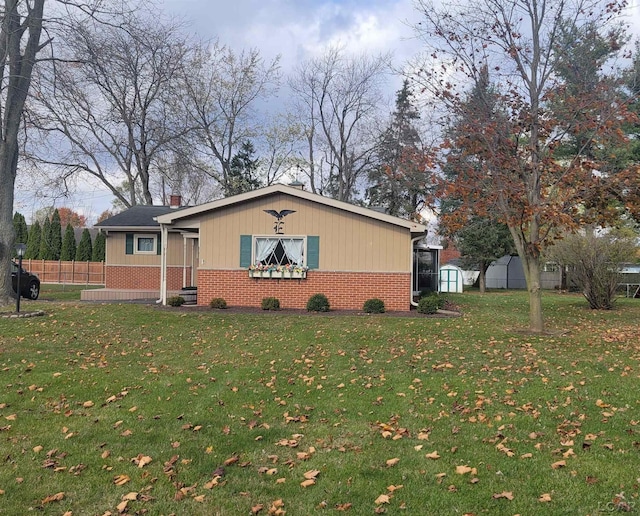 view of property exterior featuring a lawn