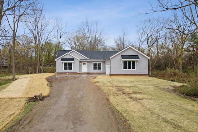 view of front of home with a front yard