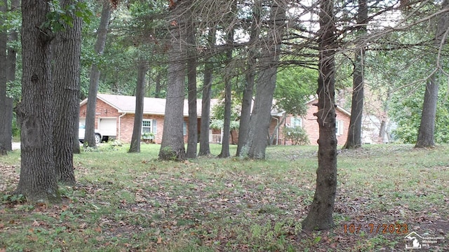 view of yard with a garage