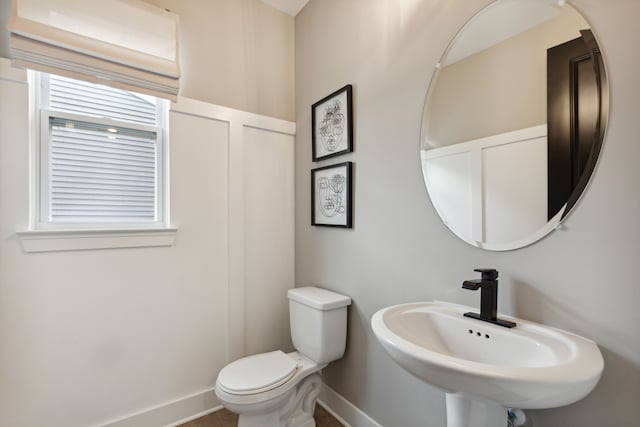 bathroom with sink and toilet