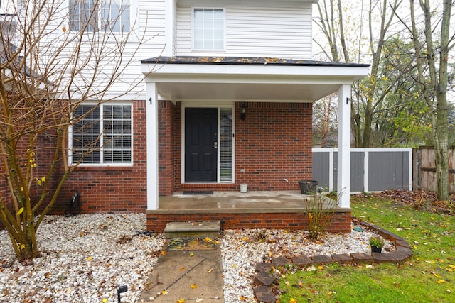 entrance to property with a porch