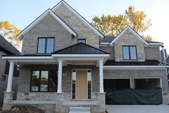 craftsman inspired home featuring a garage