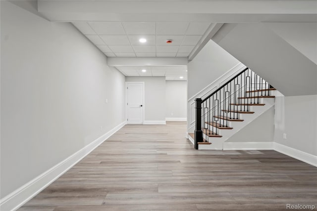 2182 Buckingham Ave, Birmingham, MI 48009 - entryway featuring stairway, wood finished floors, baseboards, recessed lighting, and a drop ceiling