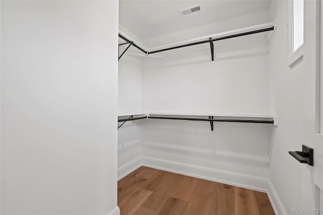 2182 Buckingham Ave, Birmingham, MI 48009 - walk in closet with wood finished floors