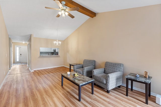 living room with ceiling fan with notable chandelier, vaulted ceiling with beams, and light hardwood / wood-style floors