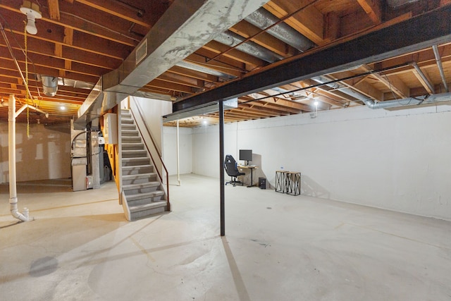 basement featuring heating unit