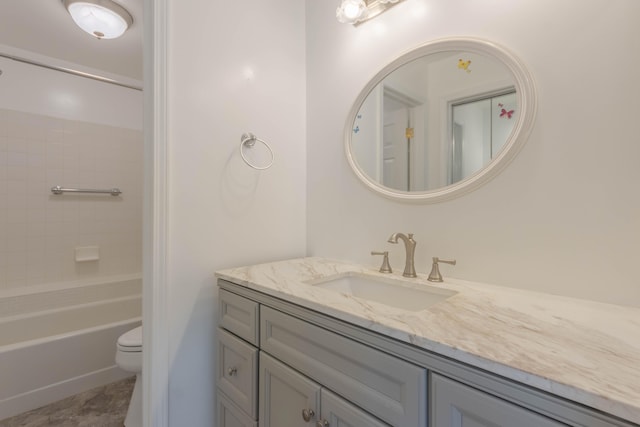 full bathroom with vanity,  shower combination, and toilet