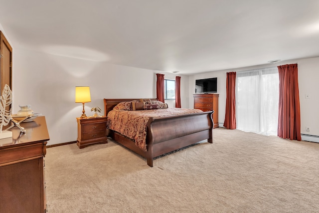 bedroom featuring light colored carpet